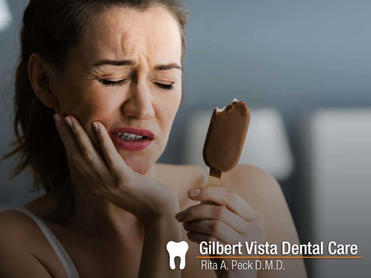 Woman Suffering From Sensitive Teeth In Gilbert, AZ