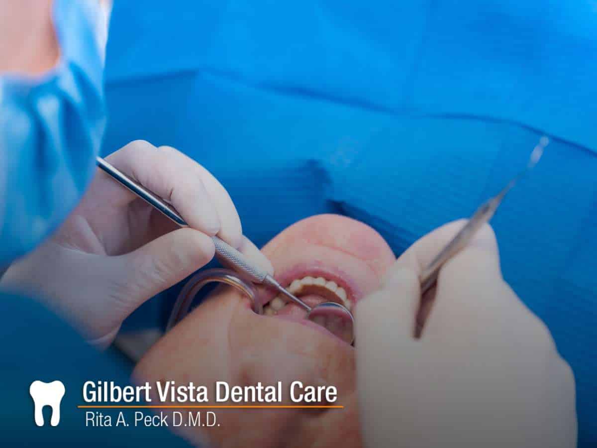 Dentist addressing dental problems with diabetes at Gilbert Vista Dental Care